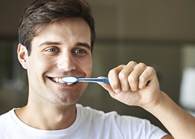 Man brushing teeth